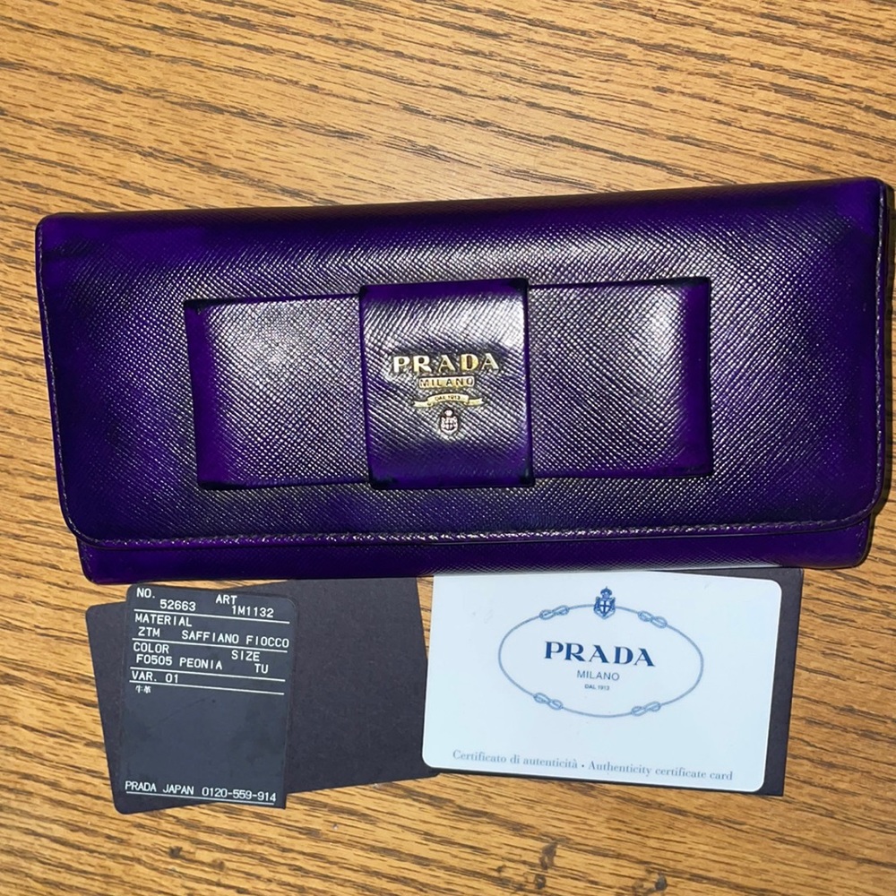 Prada bow flap wallet”Authentic “